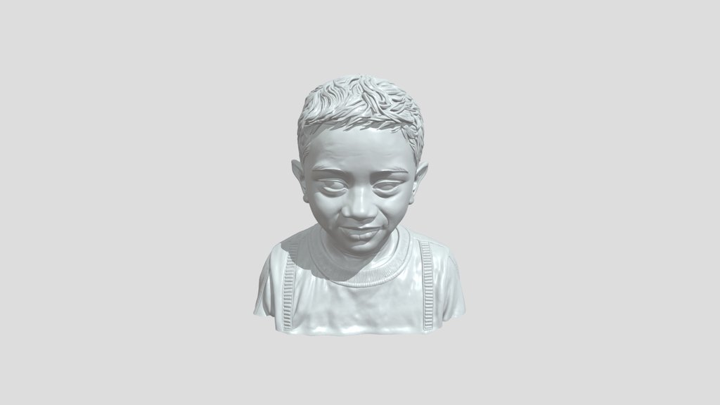 Preview of Young smiling South Asian boy
